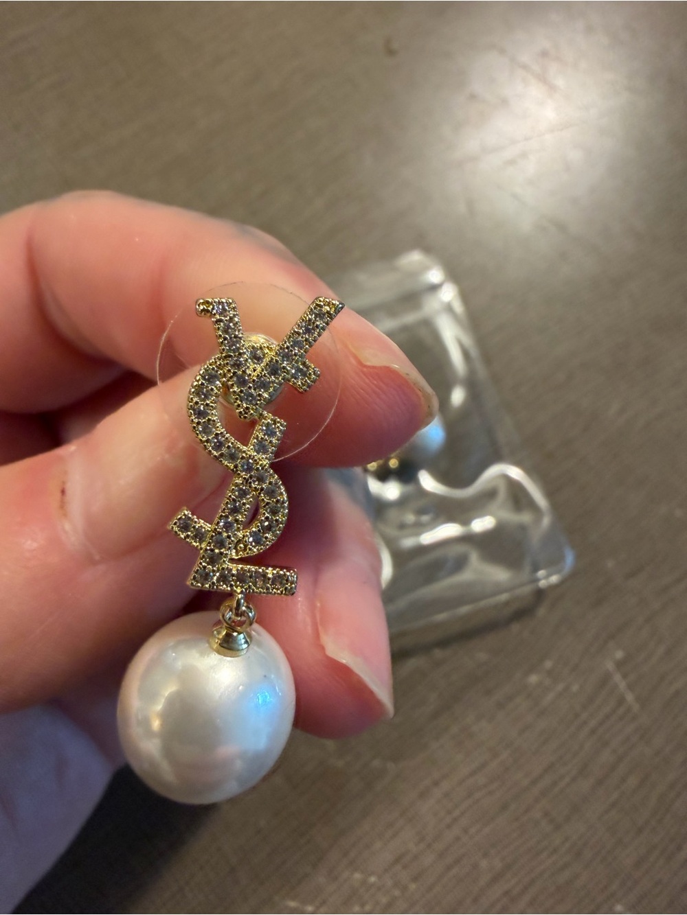Yves Saint Laurent Gold Crystal Logo with White Pearl Drop